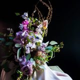 A dark and dramatic floral arrangement