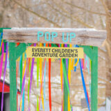 A children's play space outdoors on a snowy day