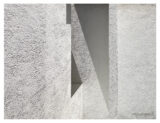 A juxtaposition of architectural features meeting at angles, creating shadows